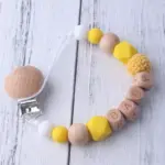 بند پستانک سیلیکونی چوبی مدل BABY - Image 3